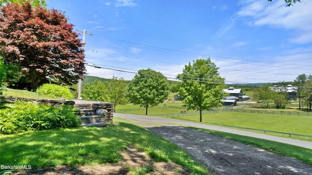 exterior space with a rural view