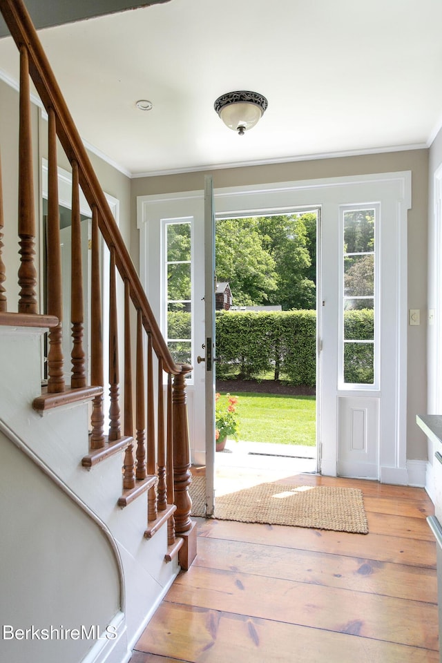 311 N Plain Rd, Great Barrington, MA 01236 - foyer entrance with ornamental molding, stairs, and hardwood / wood-style flooring