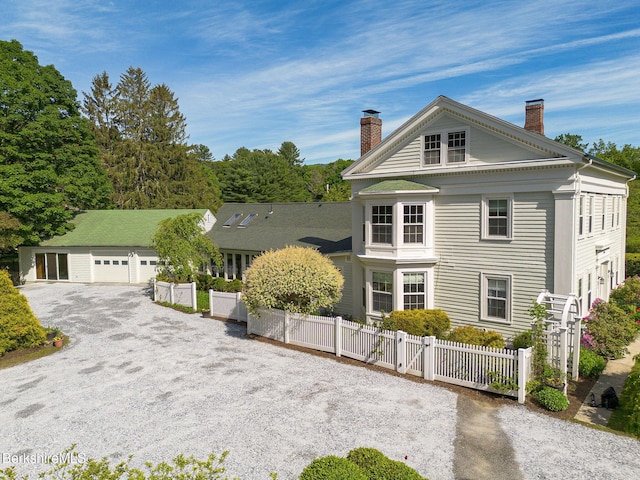 311 N Plain Rd, Great Barrington, MA 01236 - neoclassical home featuring a chimney and a detached garage