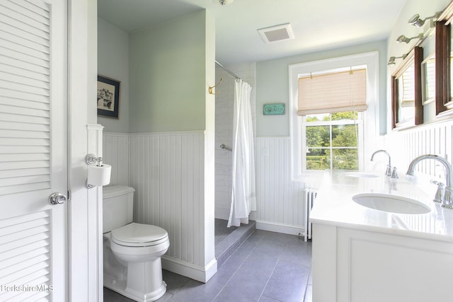 311 N Plain Rd, Great Barrington, MA 01236 - bathroom featuring toilet, tile patterned floors, vanity, a wainscoted wall, and radiator