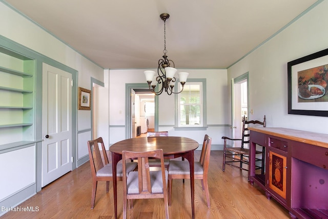 311 N Plain Rd, Great Barrington, MA 01236 - dining area with a chandelier, light wood-style flooring, and crown molding