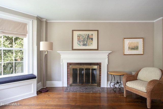 311 N Plain Rd, Great Barrington, MA 01236 - living area with wood finished floors, plenty of natural light, crown molding, and a brick fireplace