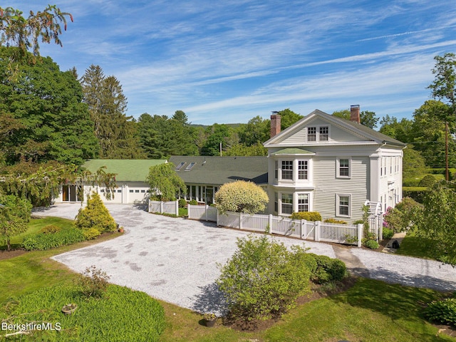311 N Plain Rd, Great Barrington, MA 01236 - view of front of property with a chimney, curved driveway, and a gate