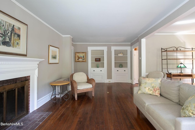 311 N Plain Rd, Great Barrington, MA 01236 - living room with hardwood / wood-style flooring, built in shelves, baseboards, a brick fireplace, and ornamental molding