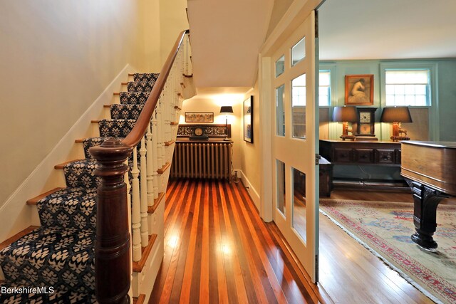 49 Main St, Stockbridge, MA 01262 - stairway with radiator and wood finished floors