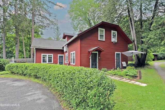 49 Main St, Stockbridge, MA 01262 - rustic home with cooling unit and a chimney