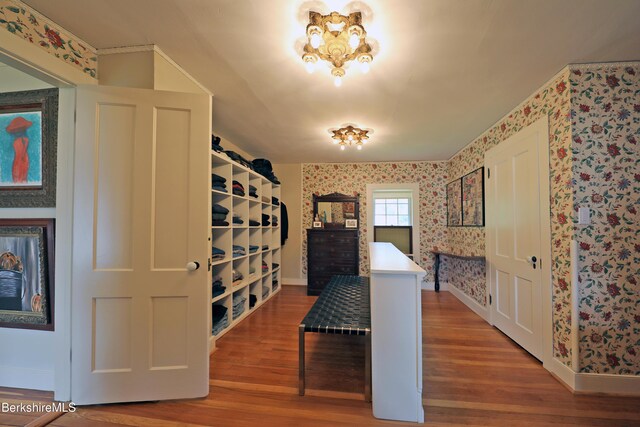 49 Main St, Stockbridge, MA 01262 - hallway with wallpapered walls and wood finished floors