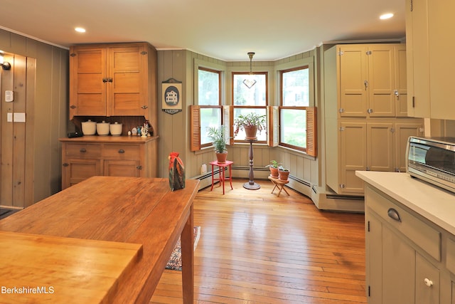 49 Main St, Stockbridge, MA 01262 - dining room with light wood finished floors, ornamental molding, a decorative wall, and recessed lighting
