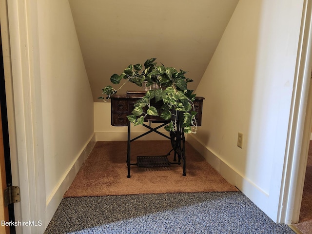 office area with carpet and lofted ceiling