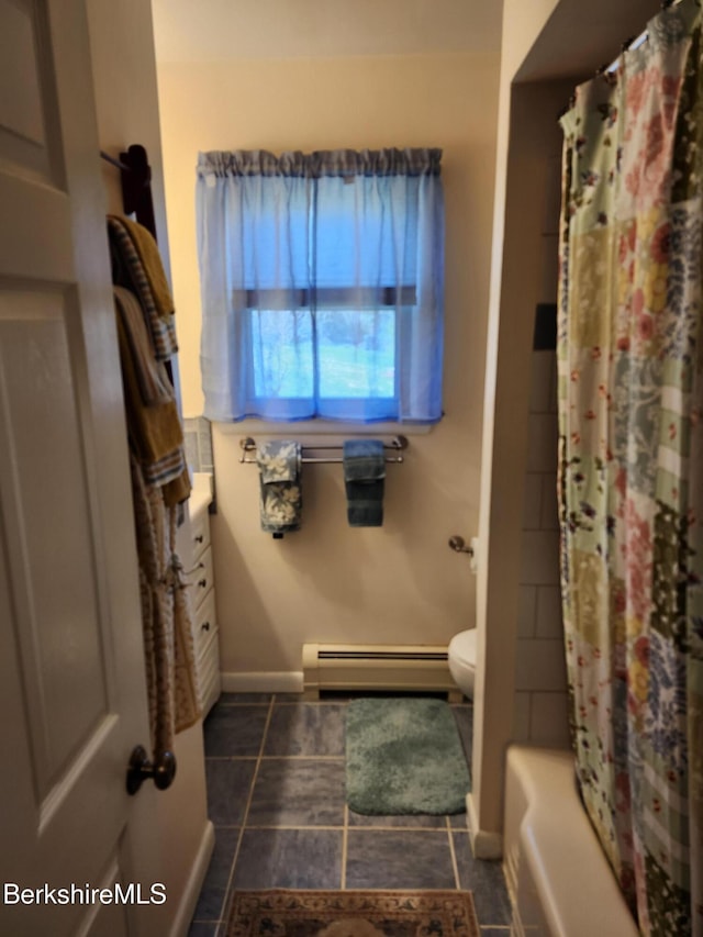 full bath with shower / tub combo, tile patterned floors, a baseboard radiator, baseboards, and toilet