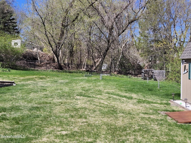 view of yard with fence