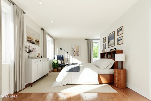 bedroom featuring light hardwood / wood-style floors