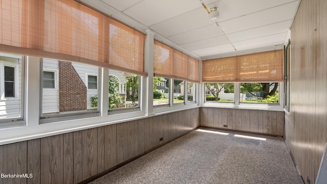 50 Harding St, Pittsfield, MA 01201 - unfurnished sunroom featuring carpet flooring and wooden walls