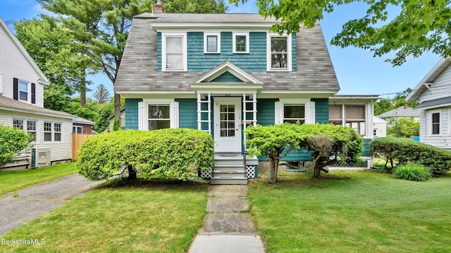 50 Harding St, Pittsfield, MA 01201 - dutch colonial with a front yard, a chimney, and entry steps