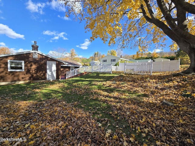 view of yard featuring fence