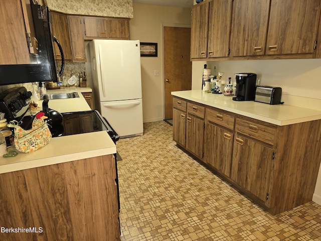 kitchen with white refrigerator