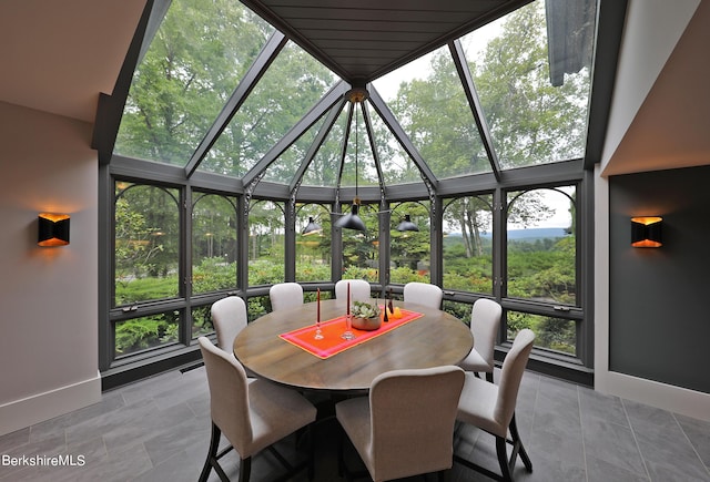 sunroom / solarium featuring a wealth of natural light