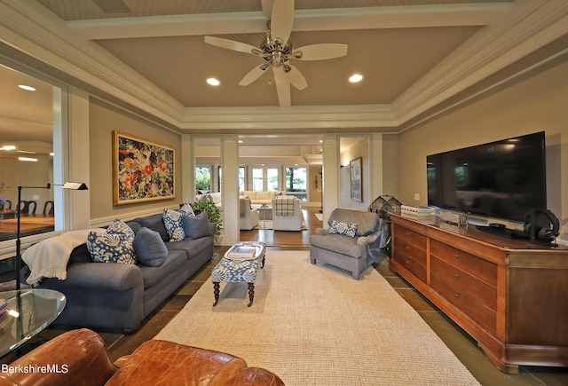 living room with beam ceiling and ceiling fan