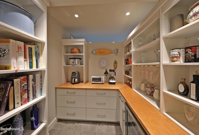 pantry with wine cooler