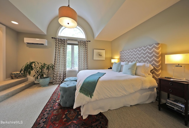 carpeted bedroom featuring a wall mounted air conditioner and lofted ceiling