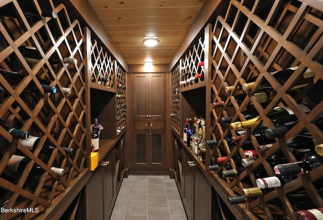 wine area featuring wooden ceiling