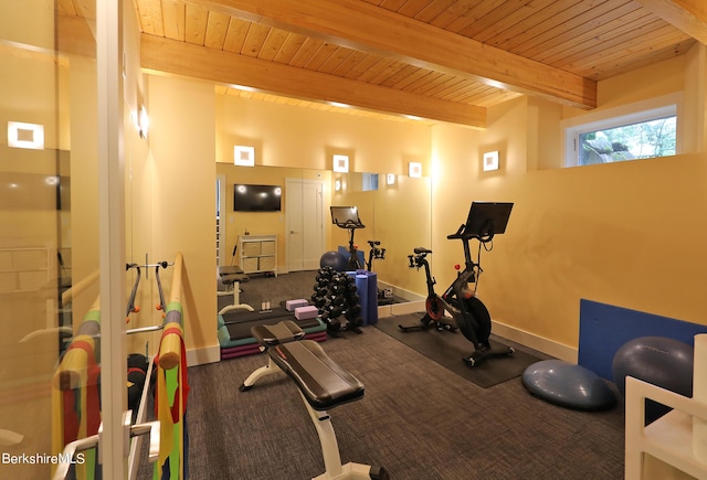 workout room with wooden ceiling