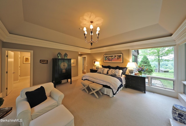 carpeted bedroom featuring a raised ceiling and an inviting chandelier