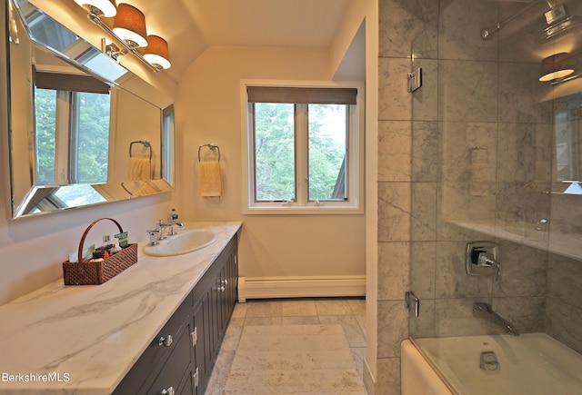 bathroom with baseboard heating, tile patterned floors, bath / shower combo with glass door, vaulted ceiling, and vanity