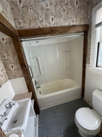 full bathroom featuring vanity, toilet, and shower / washtub combination