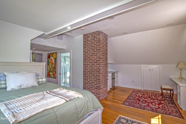 bedroom with light hardwood / wood-style flooring