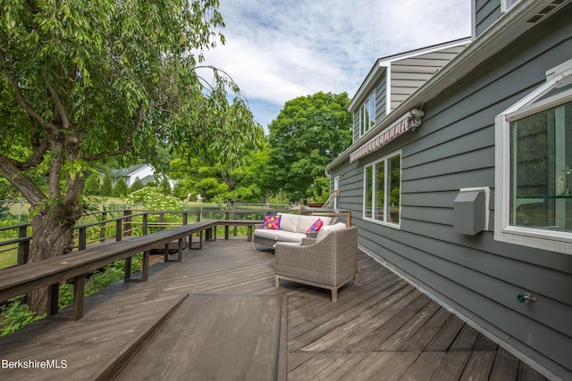 deck with an outdoor living space