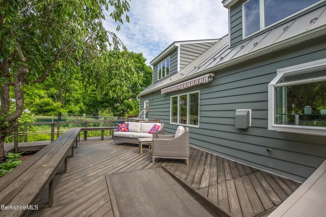 deck featuring an outdoor hangout area