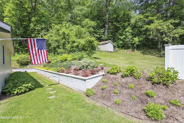 83 Bradley St, North Adams, MA 01247 - view of grassy yard with a storage unit
