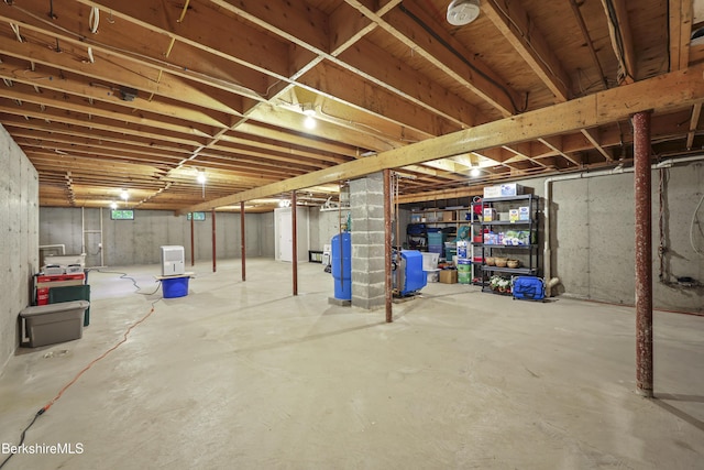 83 Bradley St, North Adams, MA 01247 - unfinished basement featuring a water pressure tank