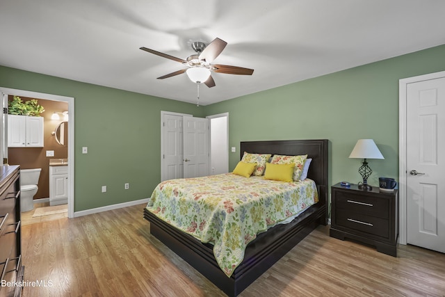 83 Bradley St, North Adams, MA 01247 - bedroom with light wood-style flooring, connected bathroom, and ceiling fan