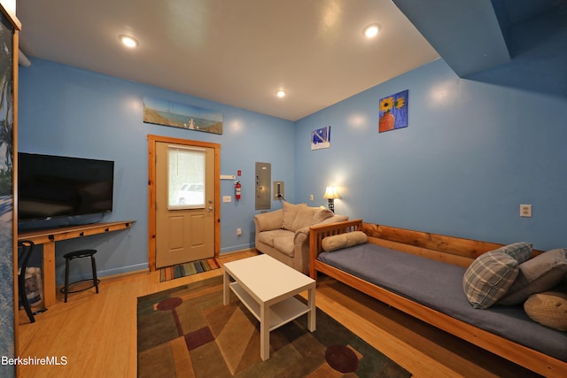 235 Algerie Rd, Becket, MA 01223 - living area featuring wood finished floors, electric panel, and recessed lighting