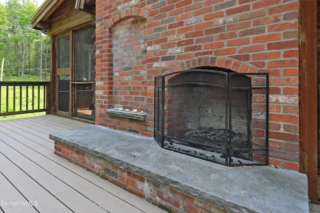 235 Algerie Rd, Becket, MA 01223 - detailed view of brick siding and an outdoor brick fireplace
