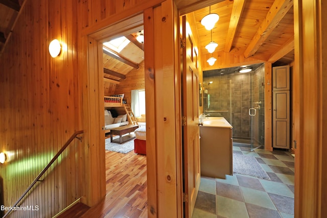 235 Algerie Rd, Becket, MA 01223 - hall featuring wood walls, a skylight, and wood ceiling