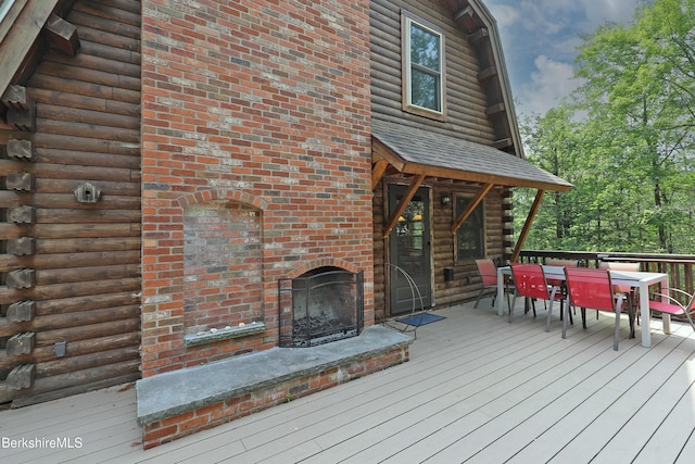 235 Algerie Rd, Becket, MA 01223 - wooden deck featuring outdoor dining area and an outdoor brick fireplace
