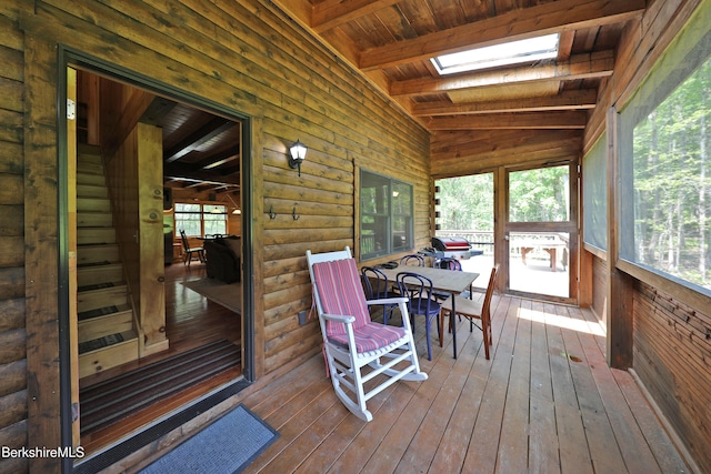 235 Algerie Rd, Becket, MA 01223 - sunroom featuring a skylight, outdoor dining space, and vaulted ceiling
