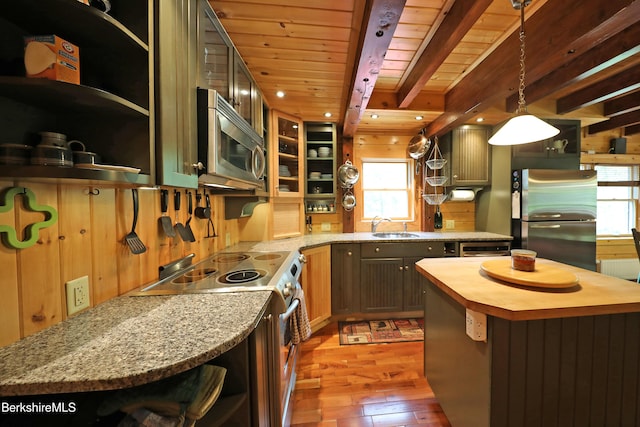 235 Algerie Rd, Becket, MA 01223 - kitchen with open shelves, stainless steel appliances, butcher block countertops, healthy amount of natural light, and a wooden ceiling with exposed beams