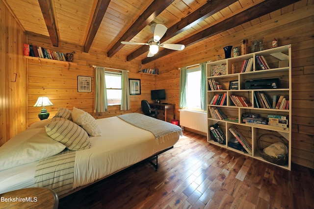 235 Algerie Rd, Becket, MA 01223 - bedroom with radiator, wooden walls, multiple windows, a wooden ceiling with exposed beams, and wood finished floors