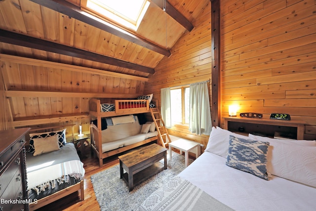 235 Algerie Rd, Becket, MA 01223 - bedroom with a skylight, wooden walls, wood finished floors, and wood ceiling