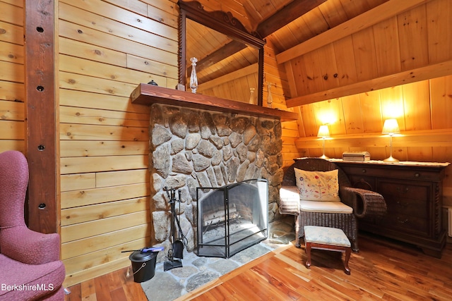 235 Algerie Rd, Becket, MA 01223 - living room with wood ceiling, wood finished floors, a fireplace, and wooden walls