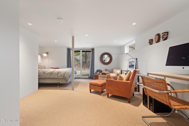 bedroom featuring access to exterior, recessed lighting, and light carpet
