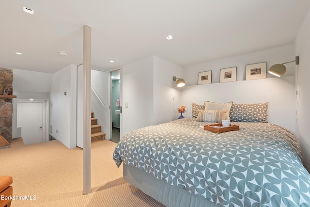 bedroom with light carpet