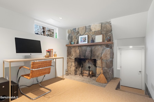 living area featuring a fireplace