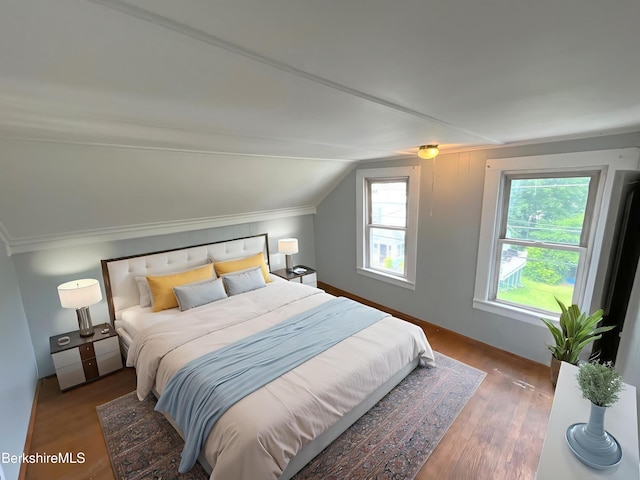 22 Marietta St, North Adams, MA 01247 - bedroom featuring wood finished floors, vaulted ceiling, and crown molding