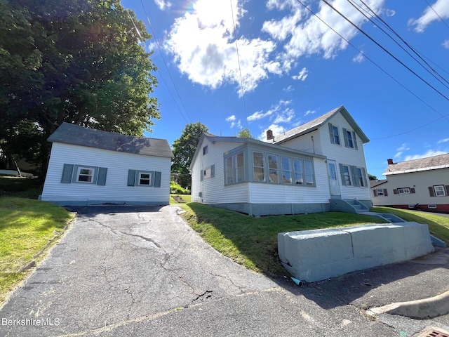 22 Marietta St, North Adams, MA 01247 - view of front of property with a front lawn and asphalt driveway