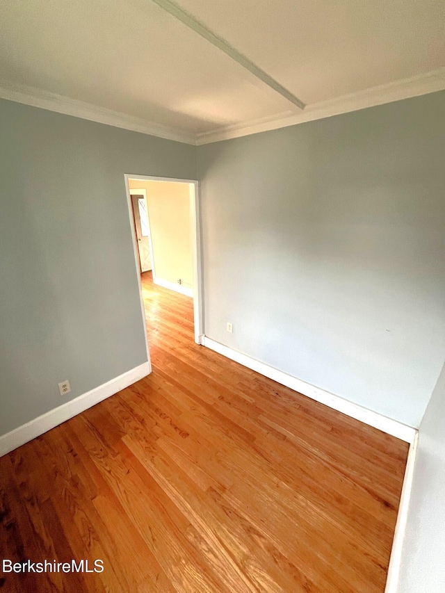 22 Marietta St, North Adams, MA 01247 - unfurnished room featuring crown molding and wood finished floors
